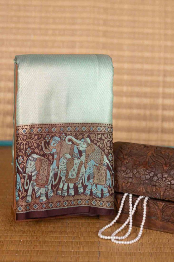 Blue and brown tissue silk saree with blouse