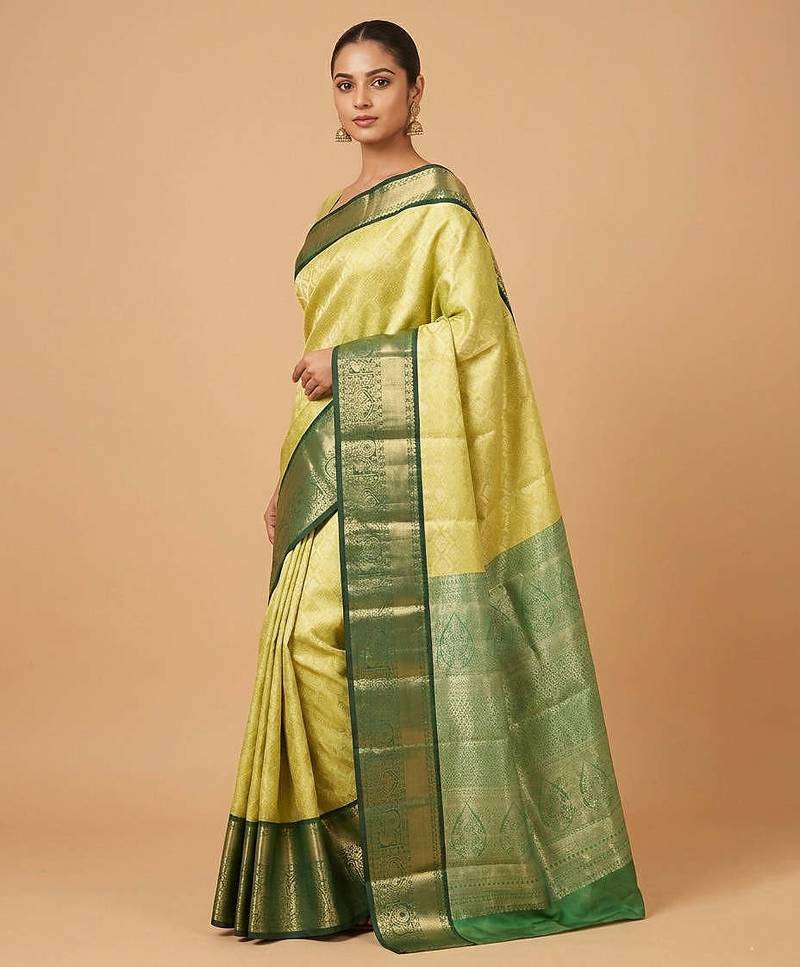 Yellow and green tissue silk saree with blouse