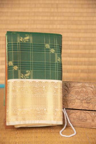 Bottle green zari kattam semi silk saree with blouse