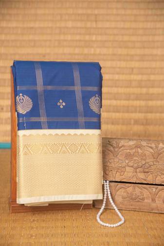 Cobalt blue and cream checked semi silk saree with blouse