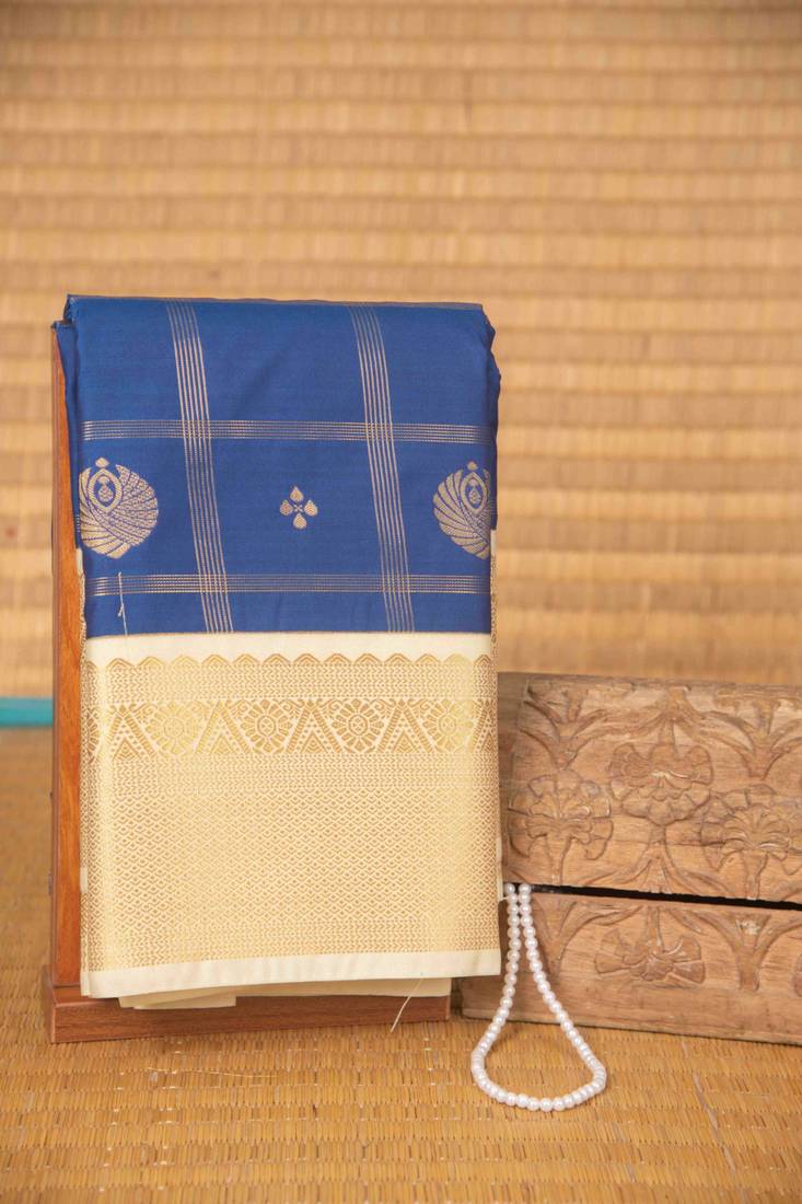 Cobalt blue and cream checked semi silk saree with blouse