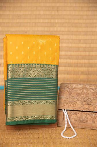 Marigold yellow and green semi silk saree with blouse