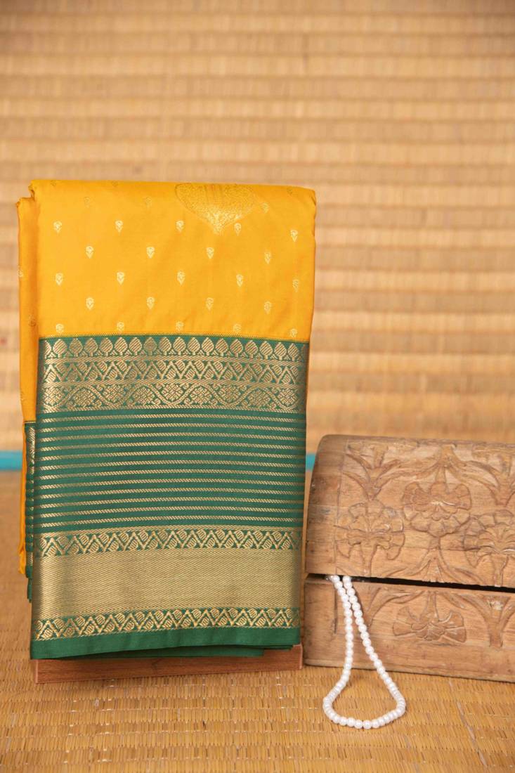 Marigold yellow and green semi silk saree with blouse