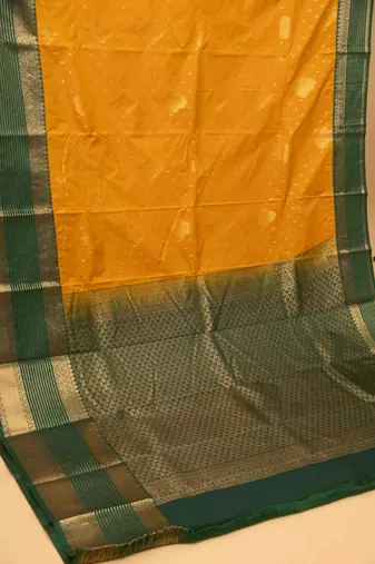 Marigold yellow and green semi silk saree with blouse