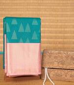 Aqua blue and baby pink brocade semi silk saree with blouse