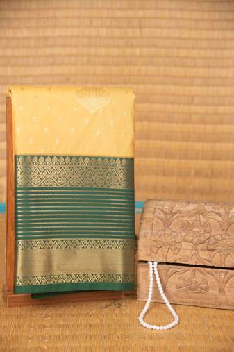 Malai cream and green semi silk saree with blouse