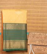 Malai cream and green semi silk saree with blouse