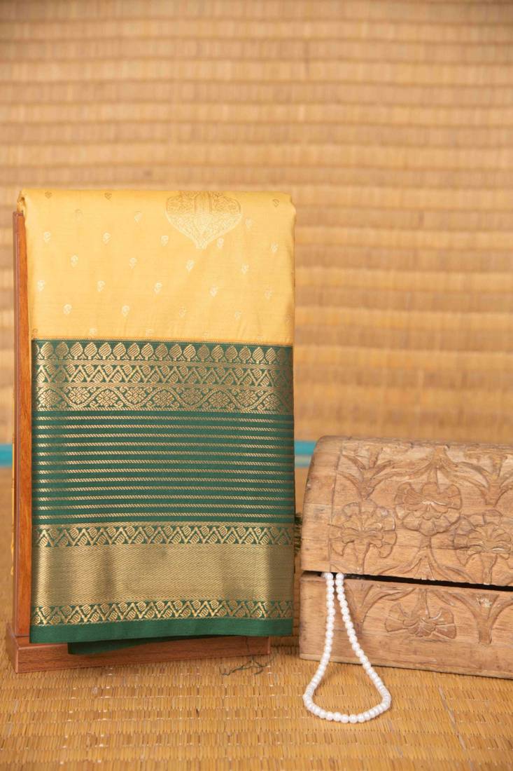 Malai cream and green semi silk saree with blouse