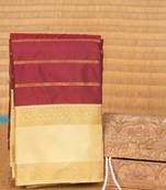 Burnt maroon and cream semi silk saree with blouse