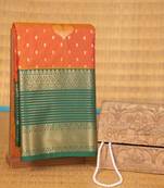 Golden orange and dark green semi silk saree with blouse
