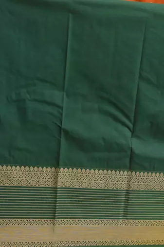 Golden orange and dark green semi silk saree with blouse