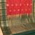 Tomato red and green semi silk saree with blouse