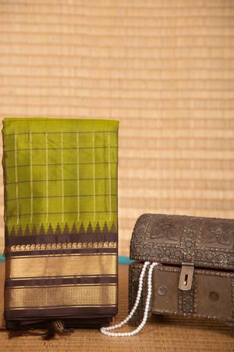 Sheen green and coffee brown touch silk saree with blouse