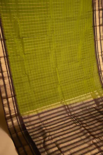 Sheen green and coffee brown touch silk saree with blouse