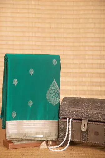 Emerald green and artichoke green semi silk saree with blouse