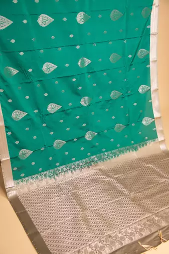 Emerald green and artichoke green semi silk saree with blouse