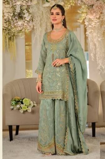 Green dola silk full stitched free size palazzo suits upto 44