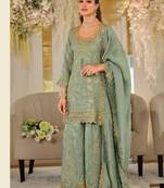 Green dola silk full stitched free size palazzo suits upto 44
