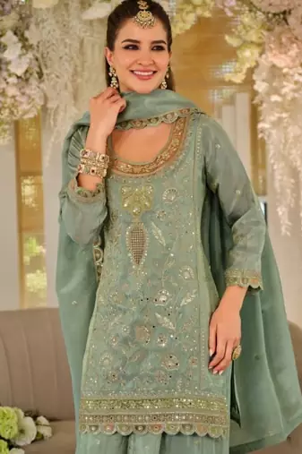 Green dola silk full stitched free size palazzo suits upto 44