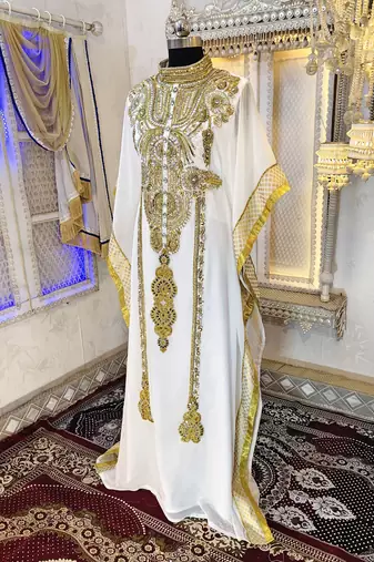 White and gold islamic kaftan