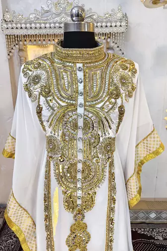 White and gold islamic kaftan