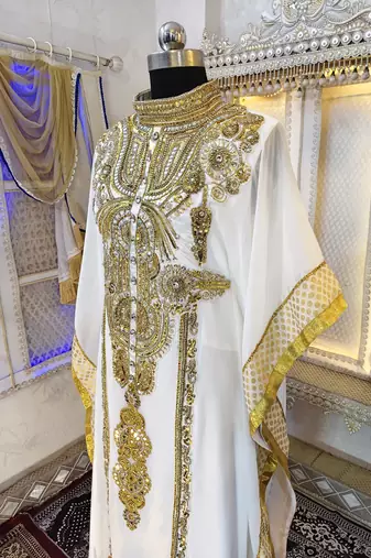 White and gold islamic kaftan
