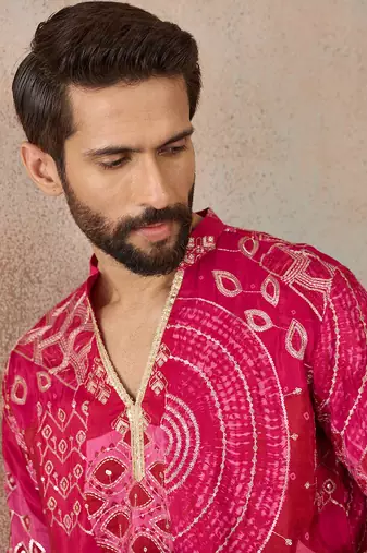 Mens pink silk blend ethnic motifs embroidered kurta with trouser
