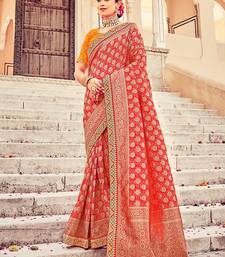 Red woven silk blend saree with blouse