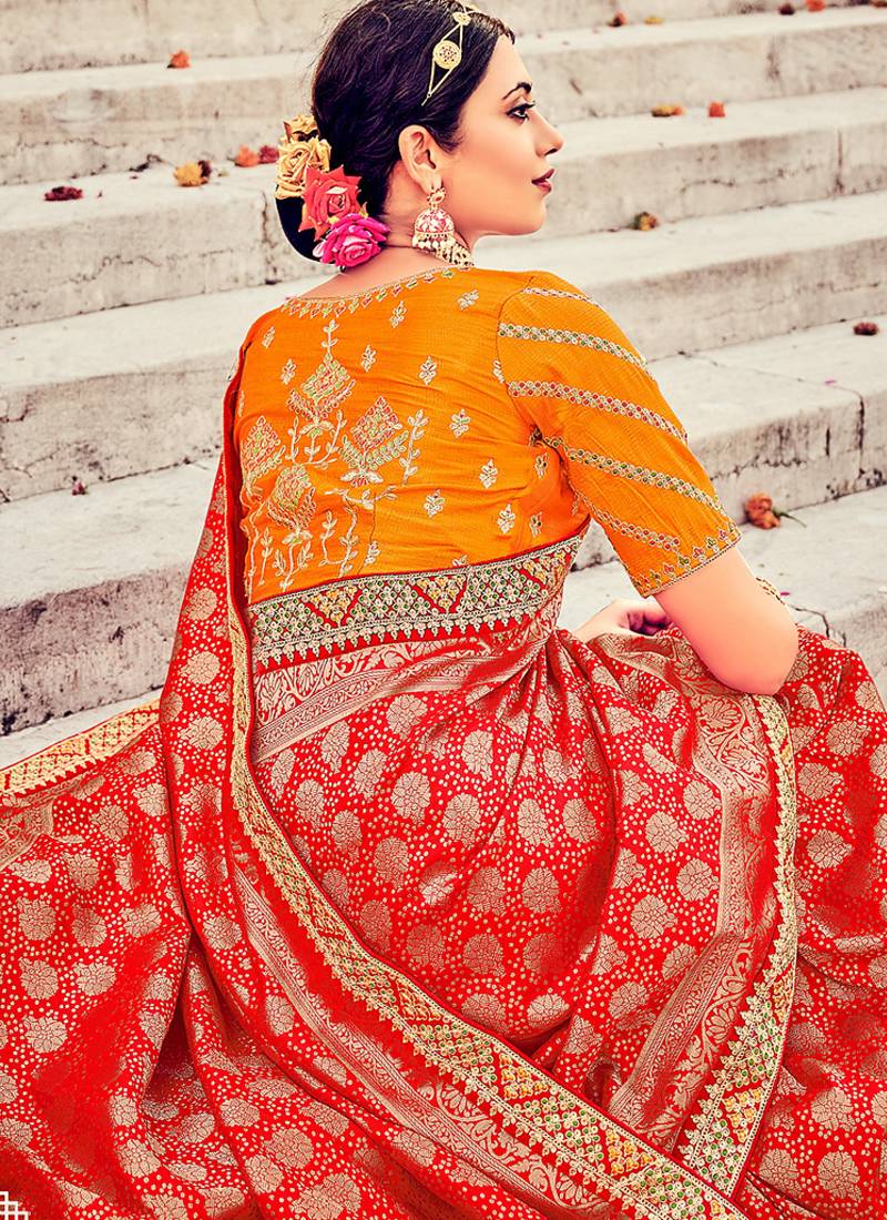 Red woven silk blend saree with blouse
