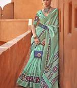 Sea green colour cotton silk patola printed saree