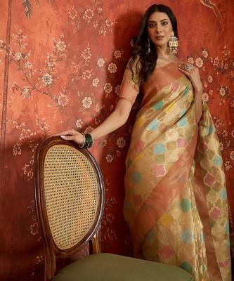 Beige tissue woven design saree with unstitched blouse piece. 1