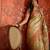Beige tissue woven design saree with unstitched blouse piece.