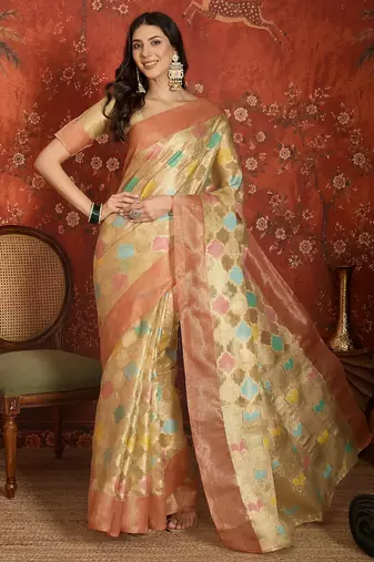 Beige tissue woven design saree with unstitched blouse piece.