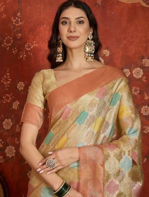 Beige tissue woven design saree with unstitched blouse piece. 3