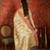 Beige tissue woven design saree with unstitched blouse piece.