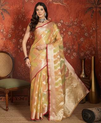 Gold tissue woven design saree with unstitched blouse piece. 2