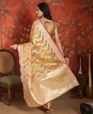 Gold tissue woven design saree with unstitched blouse piece. 3