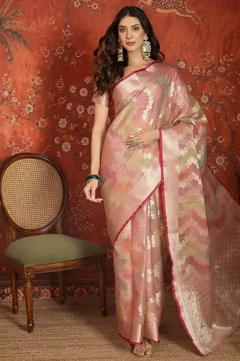 Pink tissue woven design saree with unstitched blouse piece.
