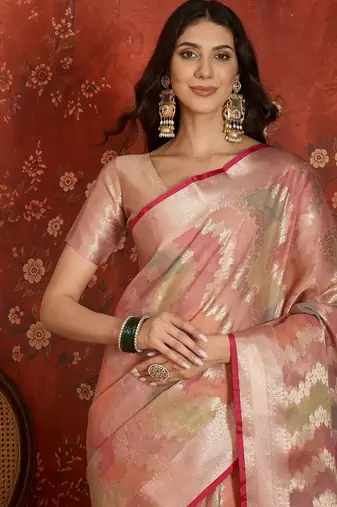 Pink tissue woven design saree with unstitched blouse piece.