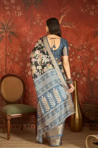 Black silk cotton printed saree with unstitched blouse piece.