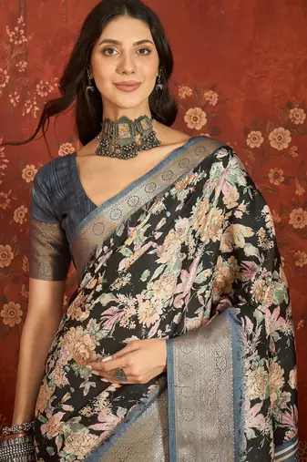 Black silk cotton printed saree with unstitched blouse piece.