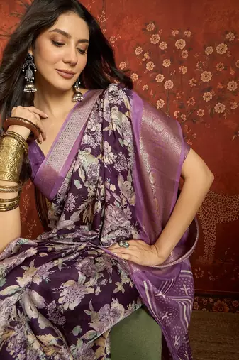 Purple silk cotton printed saree with unstitched blouse piece.