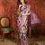Purple silk cotton printed saree with unstitched blouse piece.