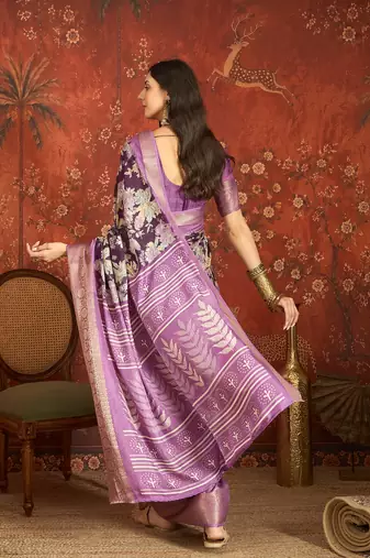 Purple silk cotton printed saree with unstitched blouse piece.