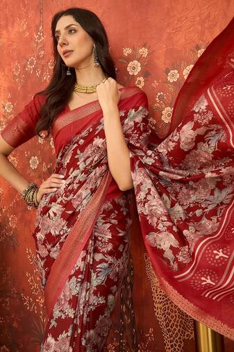 Red silk cotton printed saree with unstitched blouse piece.
