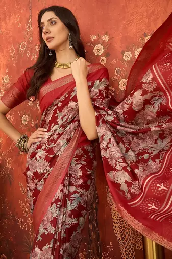 Red silk cotton printed saree with unstitched blouse piece.