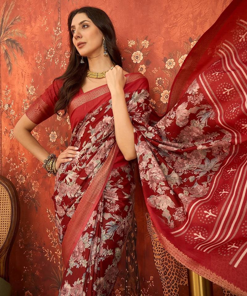 Red silk cotton printed saree with unstitched blouse piece.