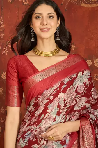 Red silk cotton printed saree with unstitched blouse piece.