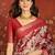 Red silk cotton printed saree with unstitched blouse piece.