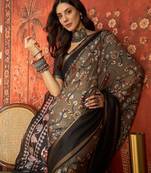Grey silk cotton printed saree with unstitched blouse piece.